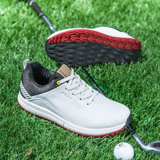 Suubtik GripTech Golf Striders beside a golf ball on the turf